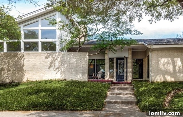 A lush side yard offering additional green space and potential for landscaping around the Merriman Park pool.