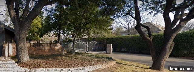 Fort Worth's Rare Single-Level Gem in a Gated Oasis 3 Gated entrance to Fort Worth's exclusive Highland Park community