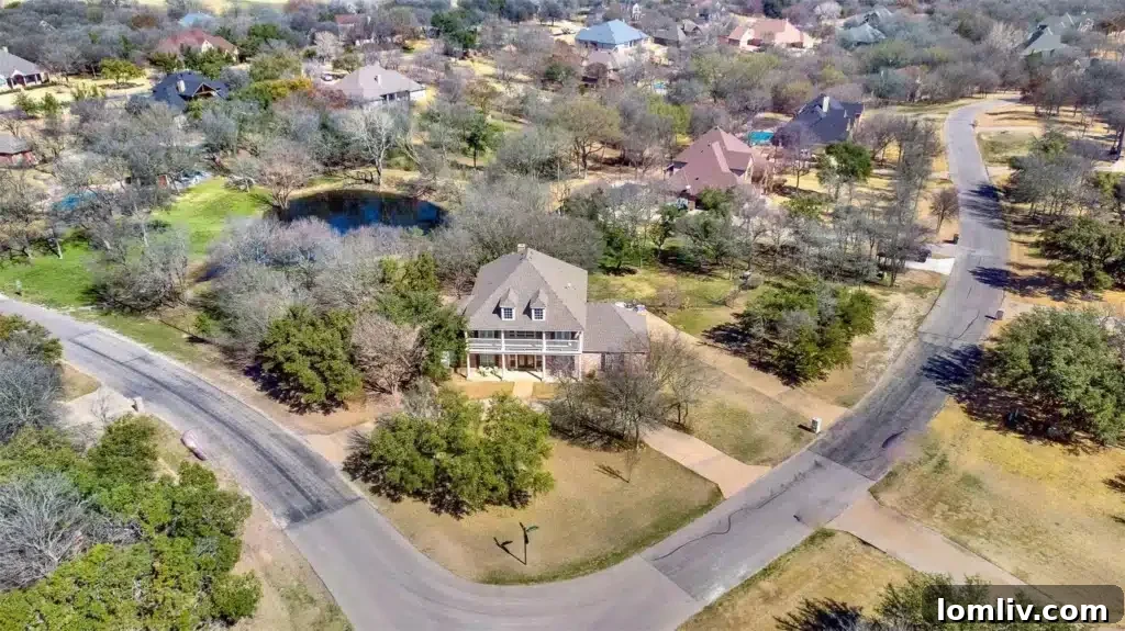 Experience North Texas: World-Class Porch Sitting Awaits at Open Houses 13 A luxurious primary bathroom in an Aledo estate home, featuring modern fixtures and elegant design.