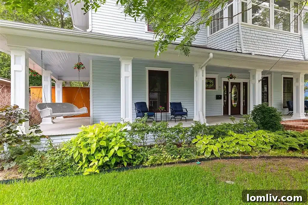 Experience North Texas: World-Class Porch Sitting Awaits at Open Houses 3 A classic wrap-around porch in McKinney with a comfortable porch swing, perfect for relaxation.