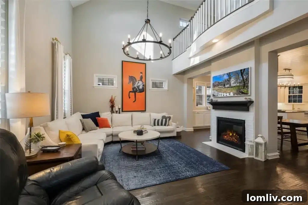 Experience North Texas: World-Class Porch Sitting Awaits at Open Houses 10 The bright and modern interior of a McKinney home, featuring high ceilings and contemporary lighting fixtures.