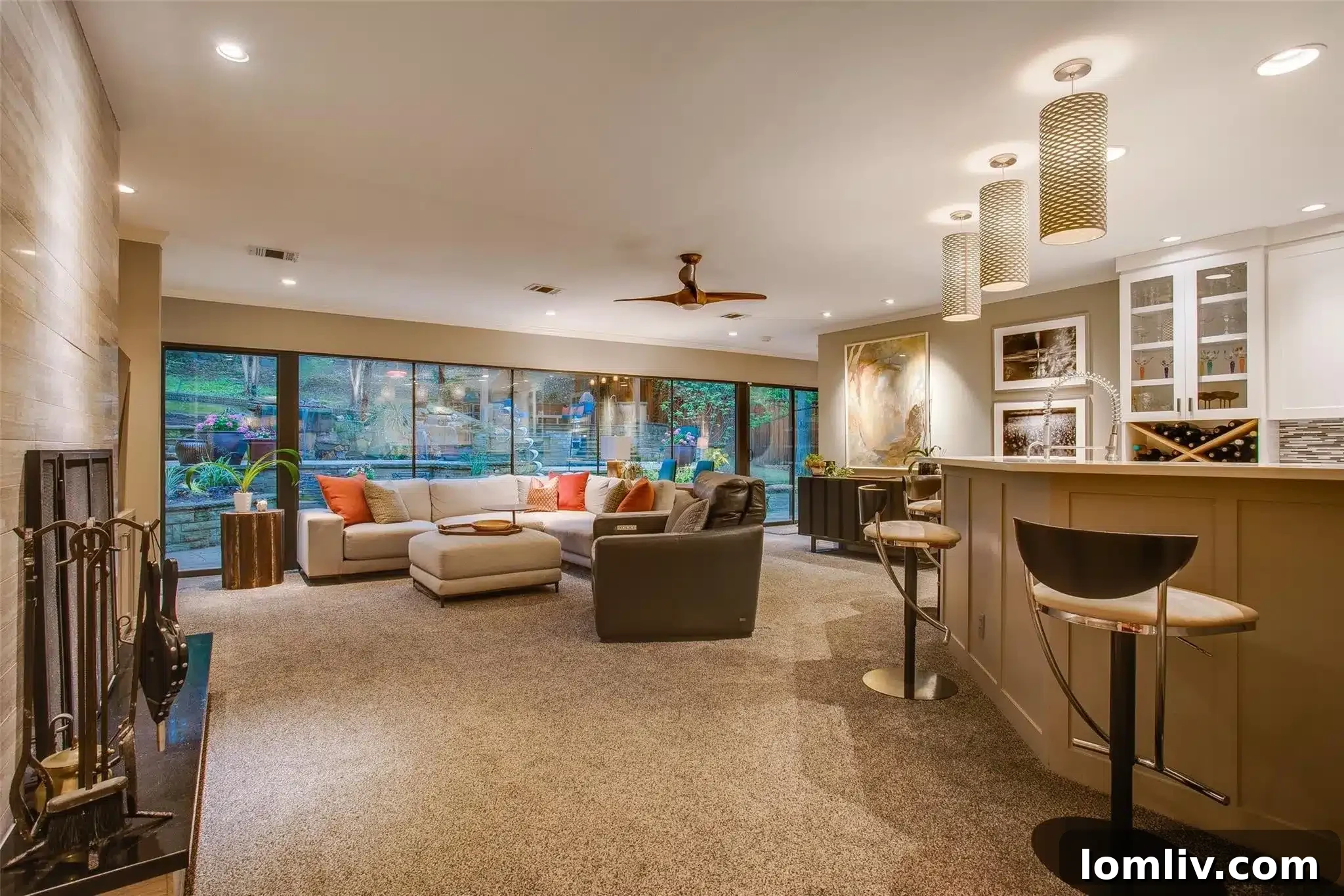 Elegant outdoor seating beneath the pergola with a fireplace