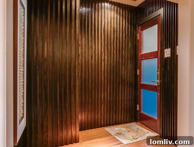 Modern interior hallway with wood paneling and elegant lighting
