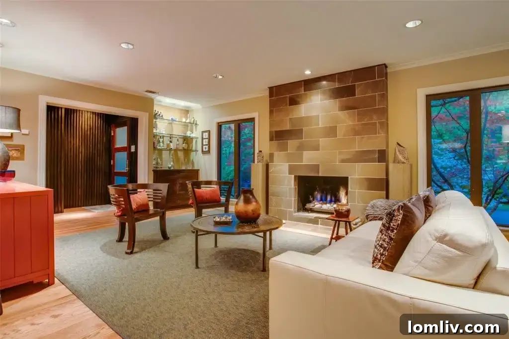 Spacious living room with a grand fireplace and ample seating