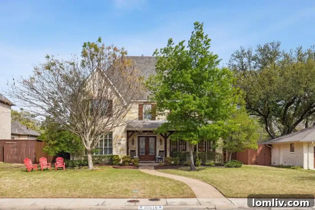 Traditional brick home with large front porch in Sparkman Club Estates, Dallas