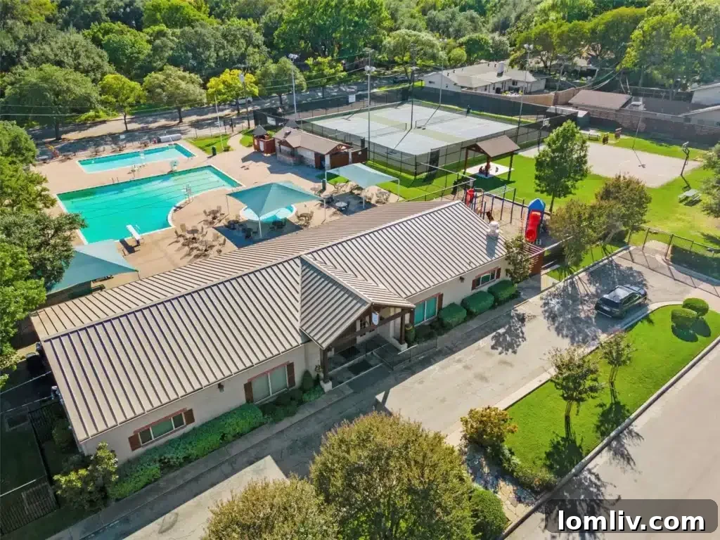 Elegant white exterior of 10616 Lathrop Drive, Sparkman Club Estates