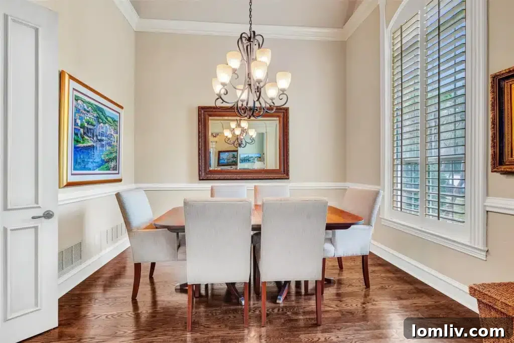 Separate dining room with large windows, flooded with natural light