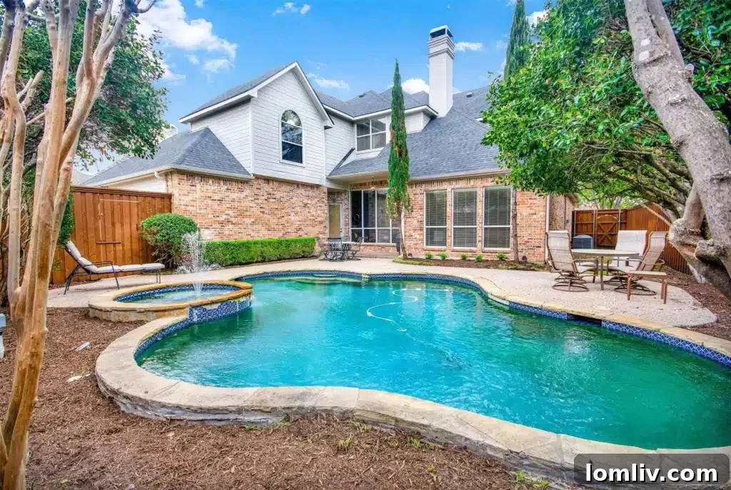 Backyard pool with clear blue water, ready for summer