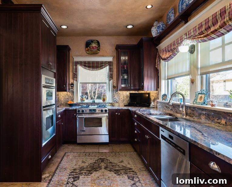 An additional view of a stately, historic home featured on the Swiss Avenue Mother's Day Home Tour, showcasing the grandeur, architectural diversity, and tree-lined streets typical of the historic district.