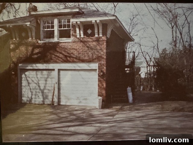 Another perspective of 6017 Swiss Avenue in 1985, highlighting a side view of the historic home with its distinctive roofline, numerous windows, and well-maintained grounds.