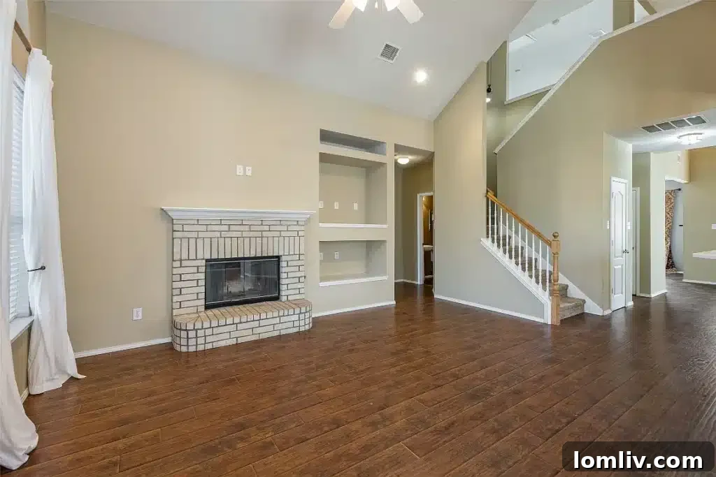 Living area of the Ranchman Blvd home, featuring modern finishes and ample space.
