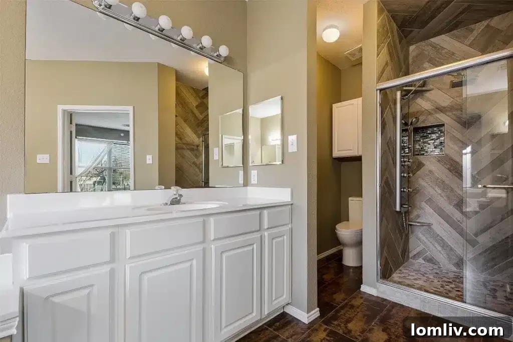 Bright and airy additional bedroom upstairs, suitable for family or guests.