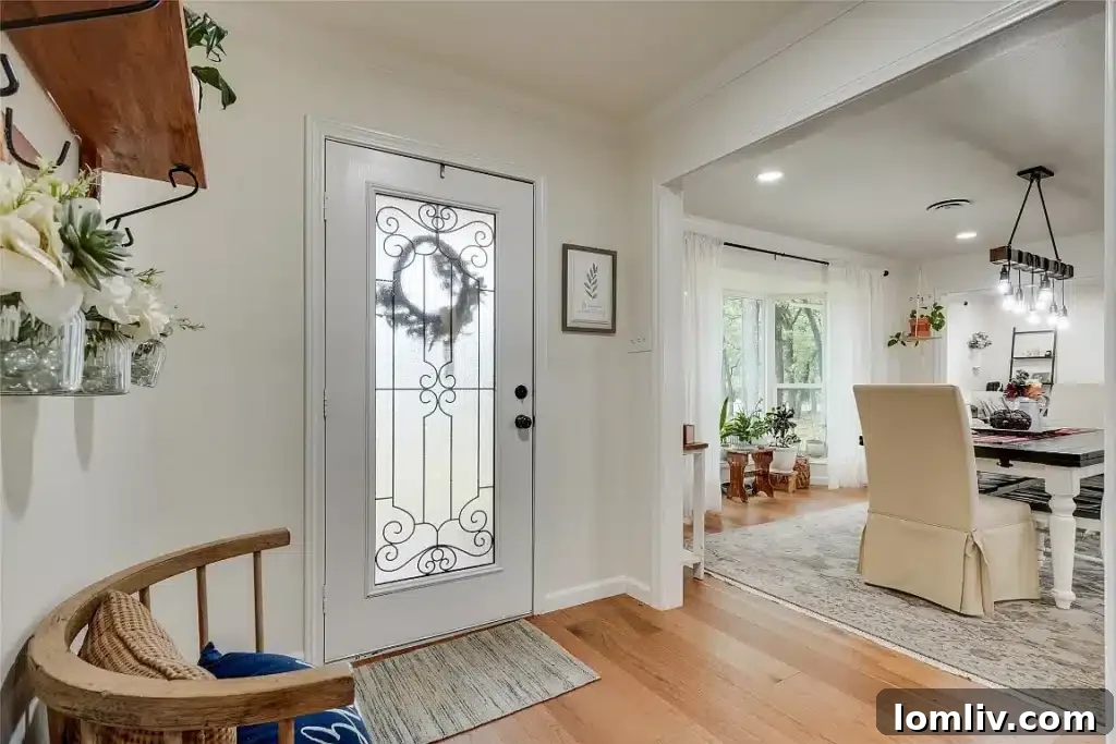 Modern kitchen with stainless steel appliances and ample counter space in the Santa Monica Drive home.