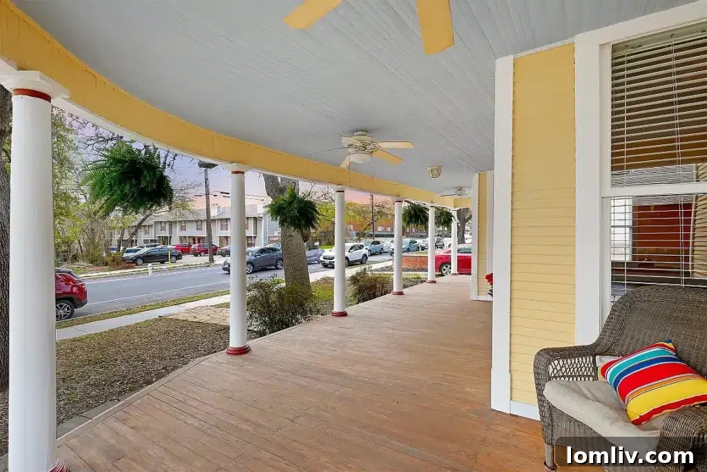 Interior view of a Victorian living room with original hardwood floors and classic decor.