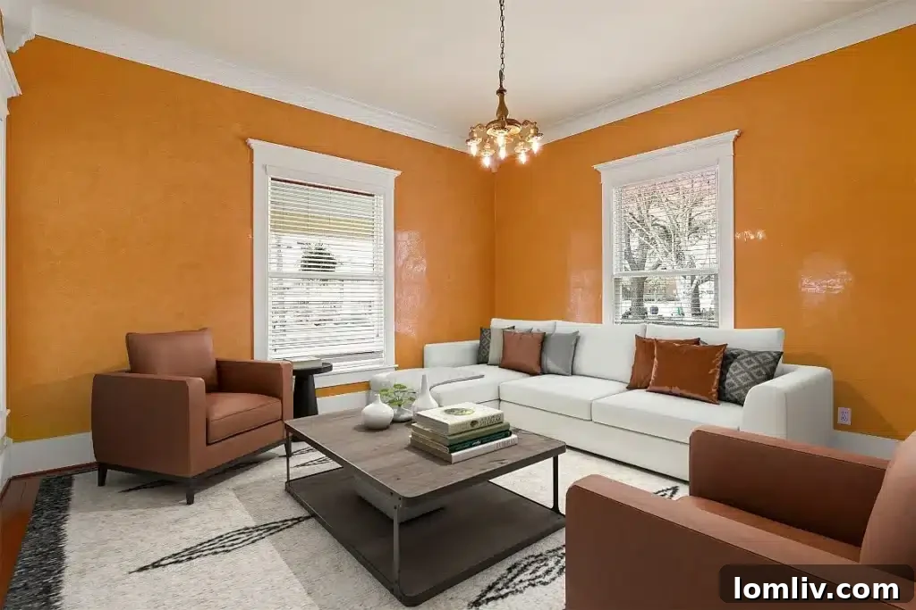 A bright bedroom featuring original windows and classic Victorian touches.