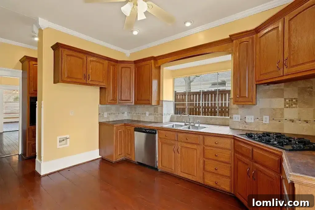 Exquisite hallway with original architectural details leading to other rooms.