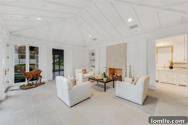 Elegant guest bathroom with modern vanity, shower, and tasteful tiling, reflecting the home's high-end finishes