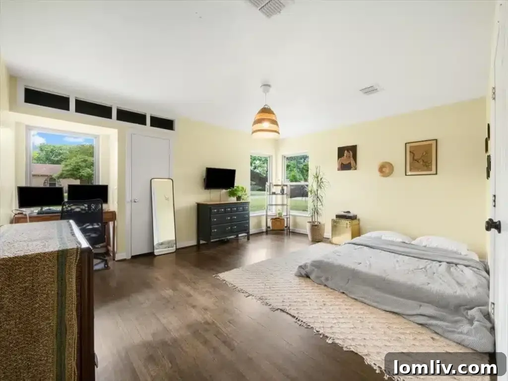 Spacious primary bedroom with sitting area