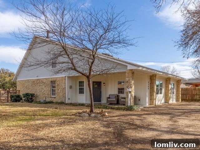 Modern kitchen and living area in renovated Granbury home