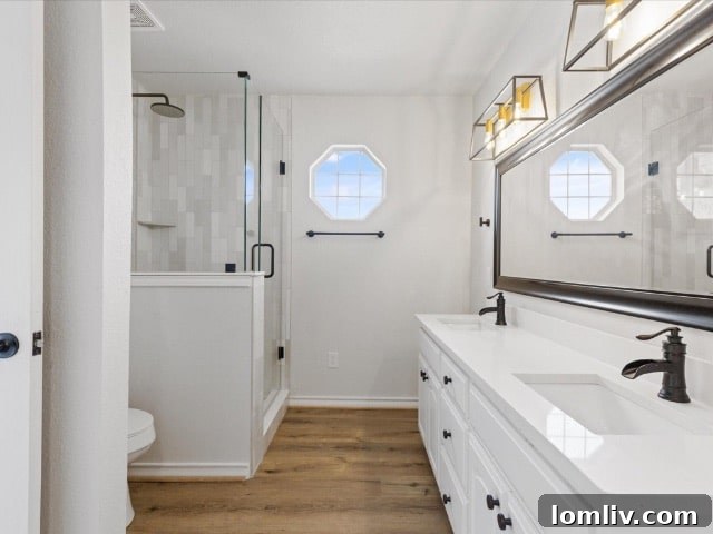 Modern bathroom in renovated Lake Granbury house