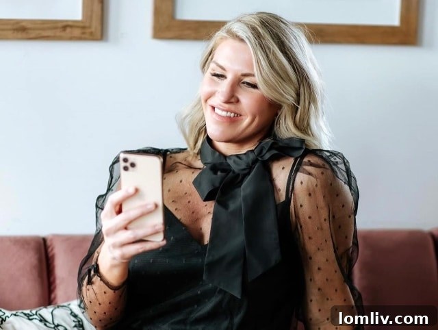 Pamela Massey-Carter smiles warmly while showcasing a property.