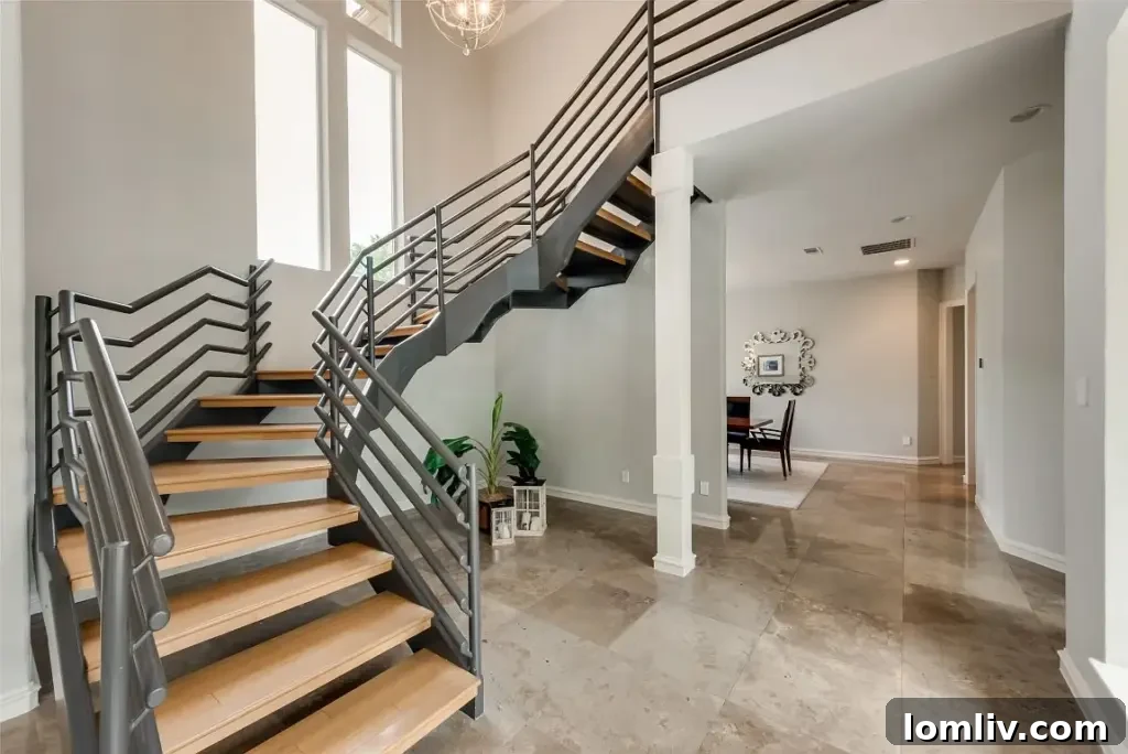 Colleyville Luxury: Homes That Redefine Grandeur 30 Modern gourmet kitchen with a large island and ample counter space at 3900 Saint James Court