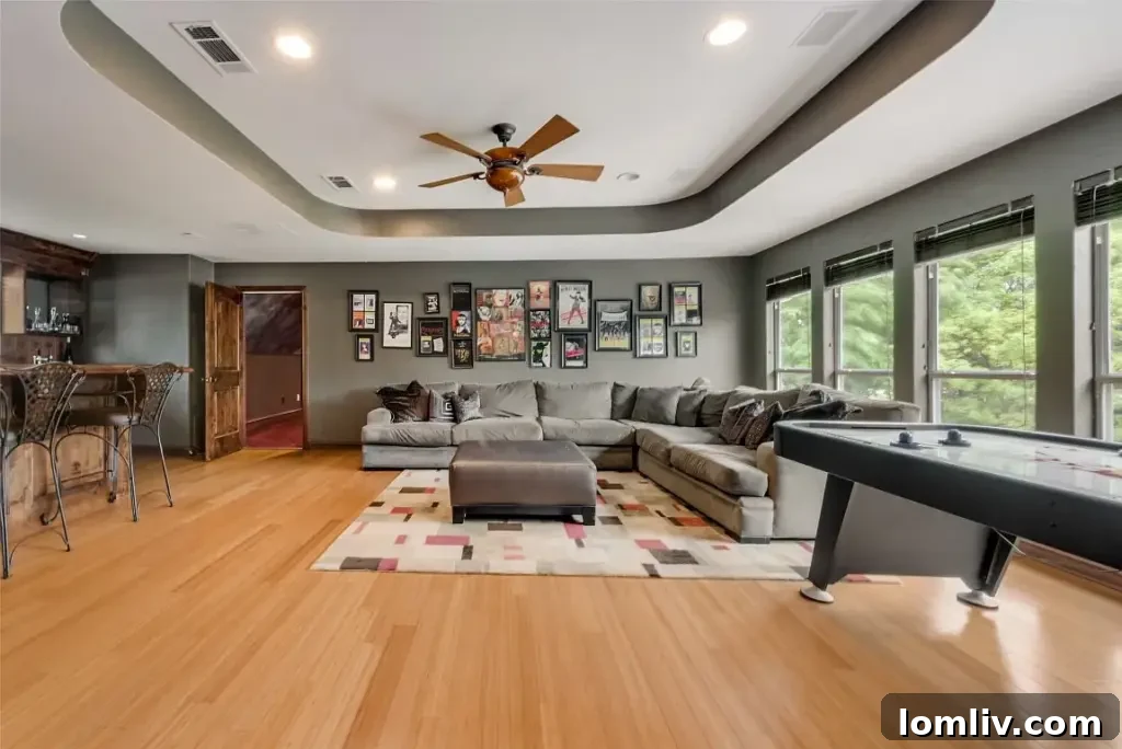 Colleyville Luxury: Homes That Redefine Grandeur 33 Luxurious master bedroom with a distinctive spiral staircase leading to a private retreat at 3900 Saint James Court