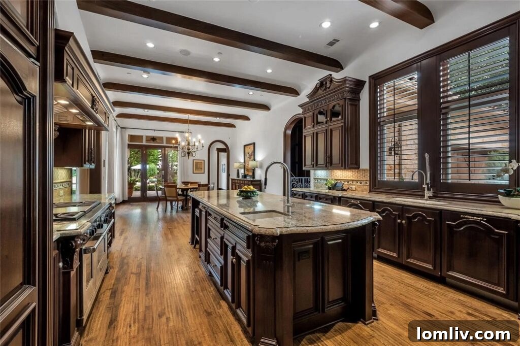 Elegant formal dining room with coffered ceilings, a hand-carved mantle, and refined details.