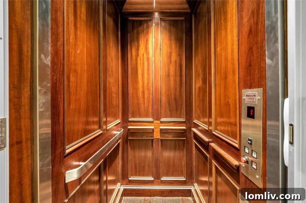 Luxurious master bathroom with dual vanities, a jetted tub, and separate shower.