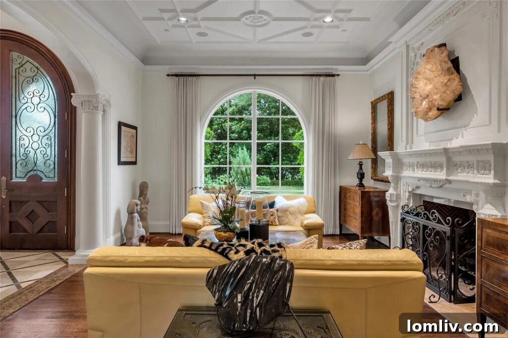 Spacious living room with a dramatic wooden ceiling, large windows, and elegant furnishings.