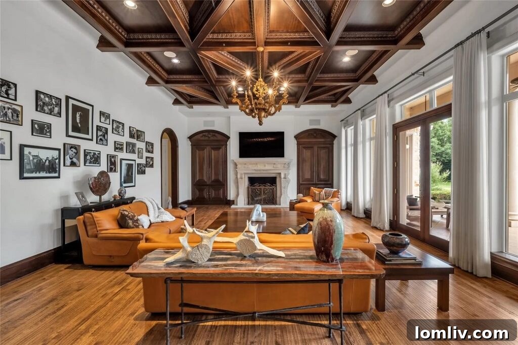 Luxurious living space featuring a fireplace, comfortable seating, and refined decor.