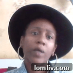 Brittany Jones, a housing voucher holder, speaks at a public meeting