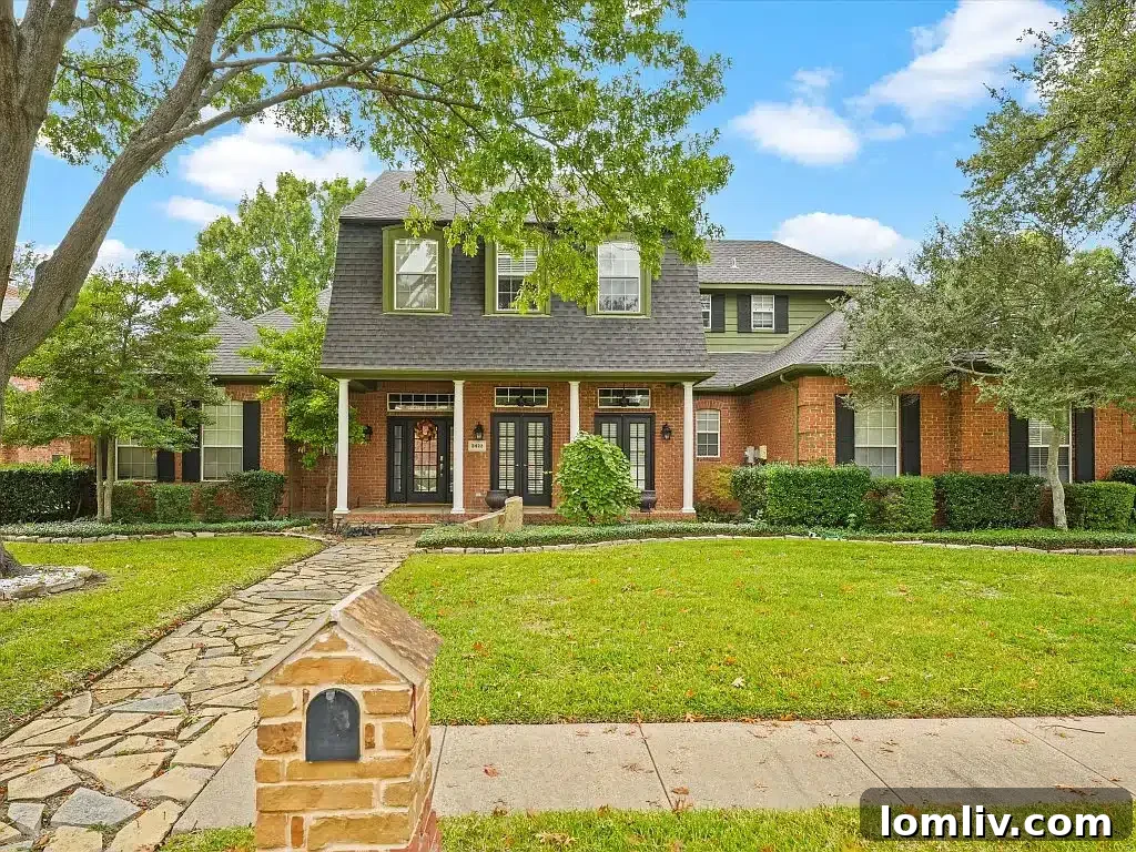 Exquisite custom home at 3422 Mallard Park in Rowlett, offering stunning curb appeal
