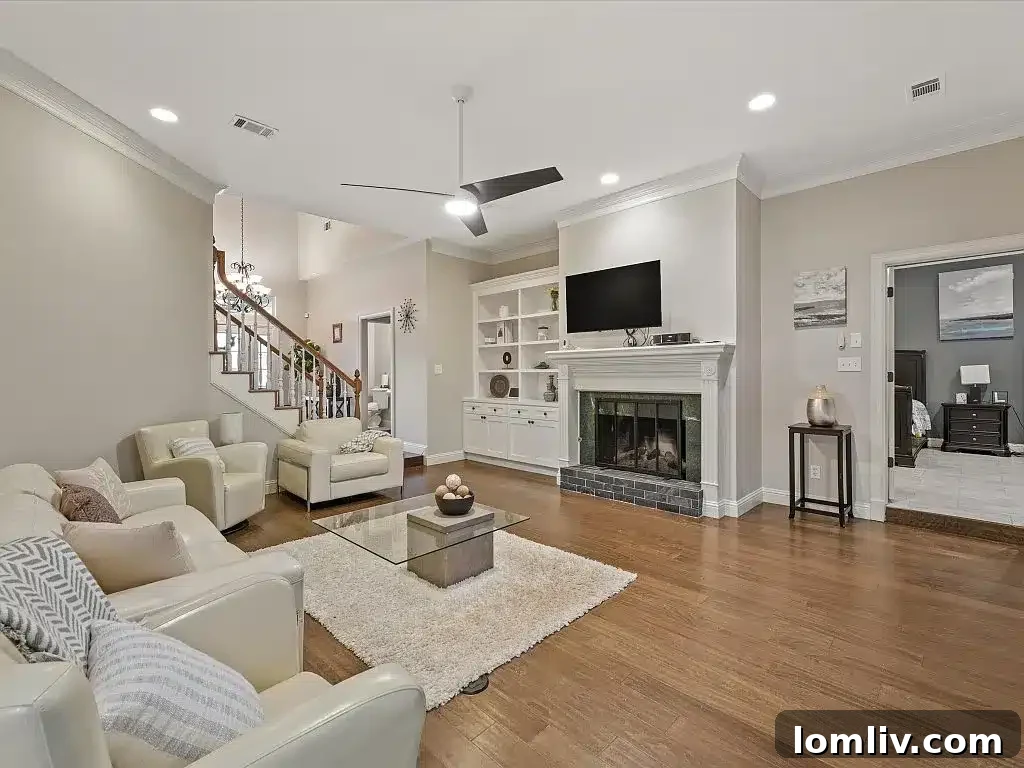 Charming facade of this exquisite custom Rowlett home with manicured landscaping.