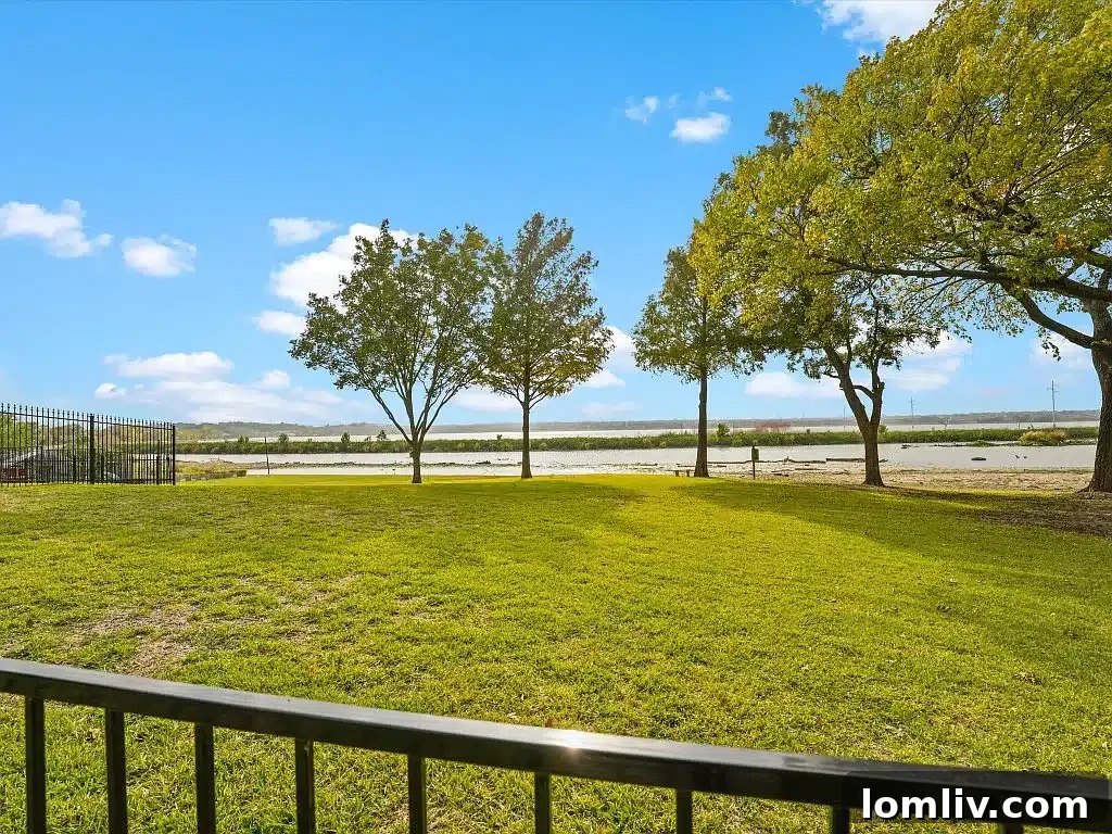 Spacious bedroom with a cozy atmosphere and ample light in this charming Rowlett residence.