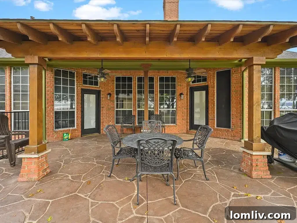 Picturesque waterfront view from the backyard of this Rowlett custom home in Mallard Cove.