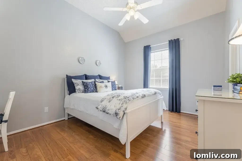 Comfortable master bedroom in this Rowlett lakeside residence
