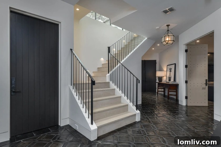 Game room with custom leather door in luxury home