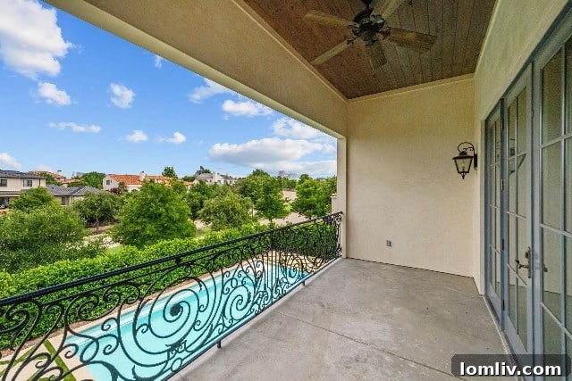 Scenic view from the primary suite balcony at 5160 Peach Willow Lane