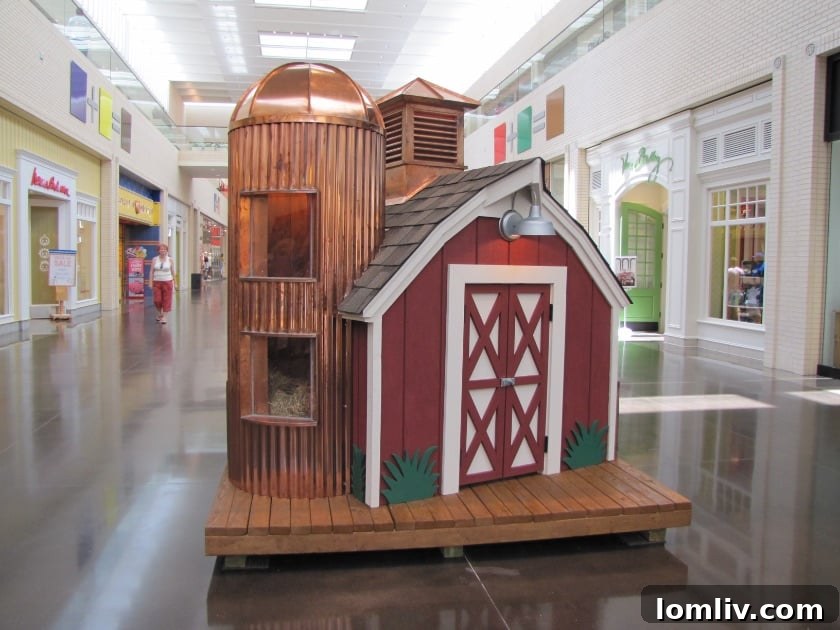 LRO Residential's The Old Red Barn playhouse, a beloved design from 2012, showcasing intricate craftsmanship.