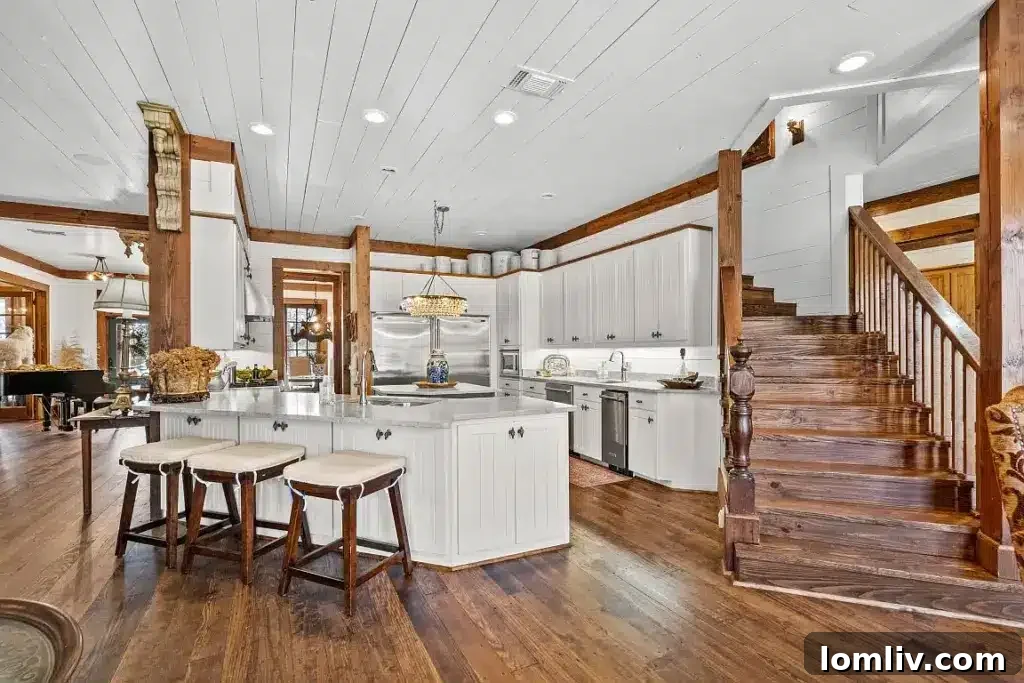 An interior shot showing pine floors throughout a spacious room