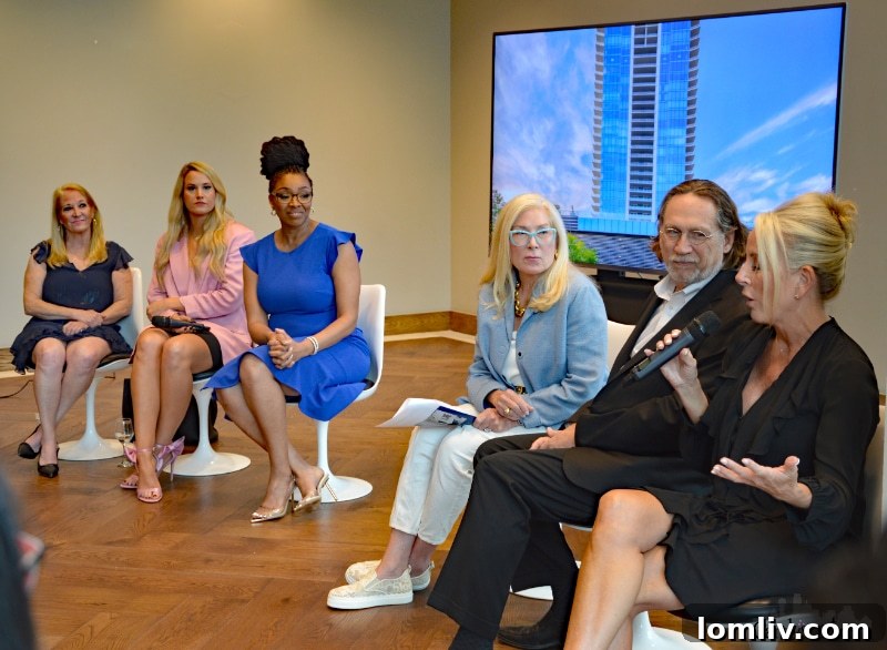 Attendees mingling and networking at the daltxrealestate.com luxury real estate event