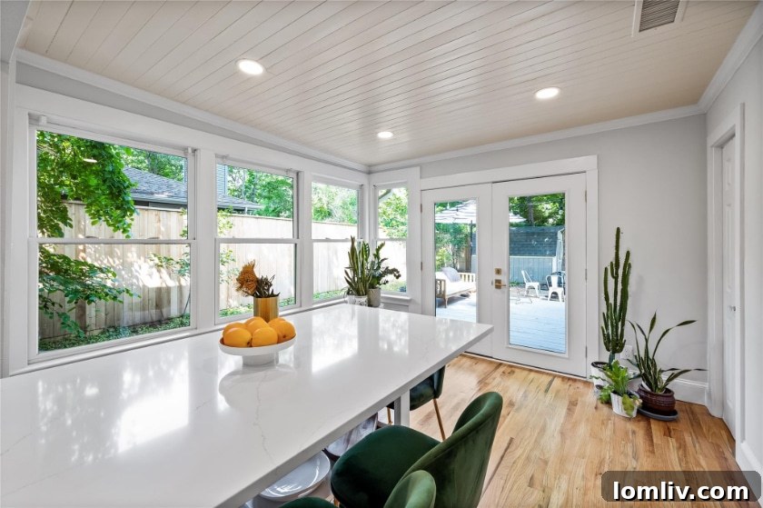 Detail view of the kitchen with Z-line appliances and elegant quartz countertops.
