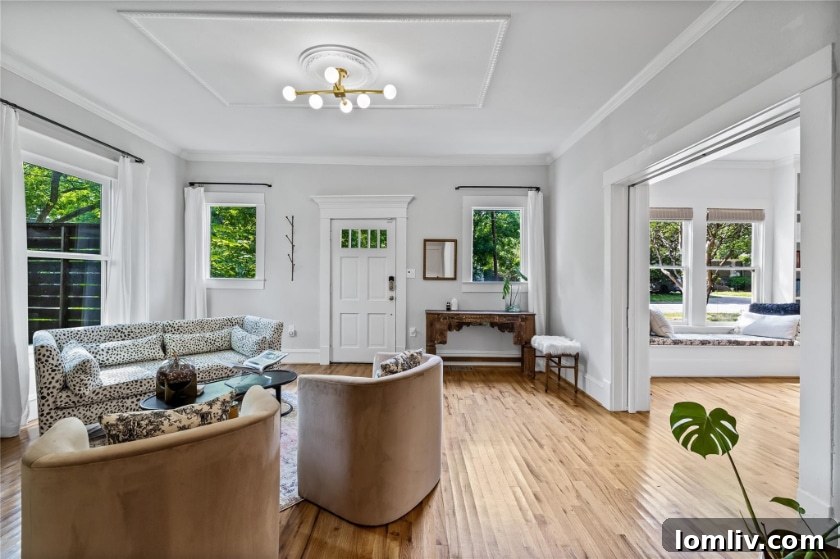 A beautifully restored interior space showing Victorian picture rail trim in a bedroom, highlighting era-appropriate details.