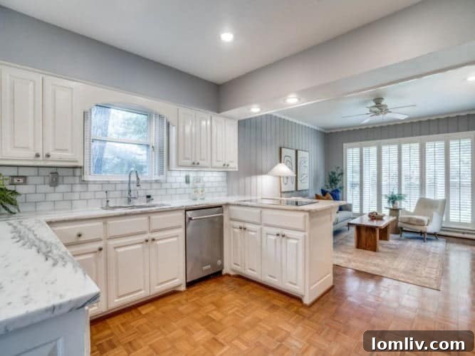 Comfortable and well-lit bedroom with fresh paint and modern decor