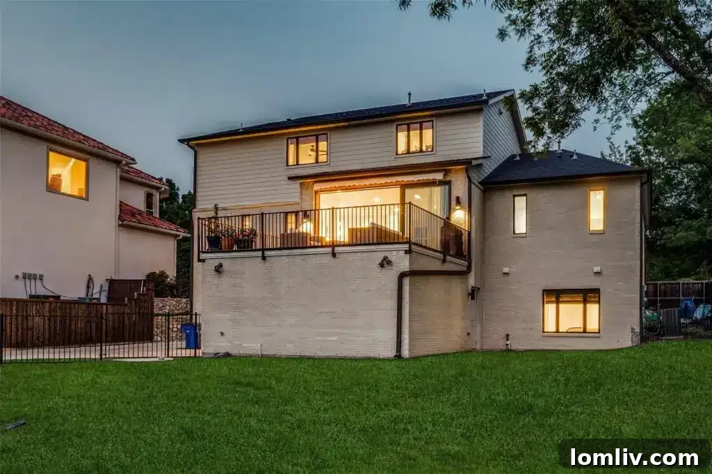 Spacious back balcony offering partial views of White Rock Lake, perfect for entertaining or relaxation