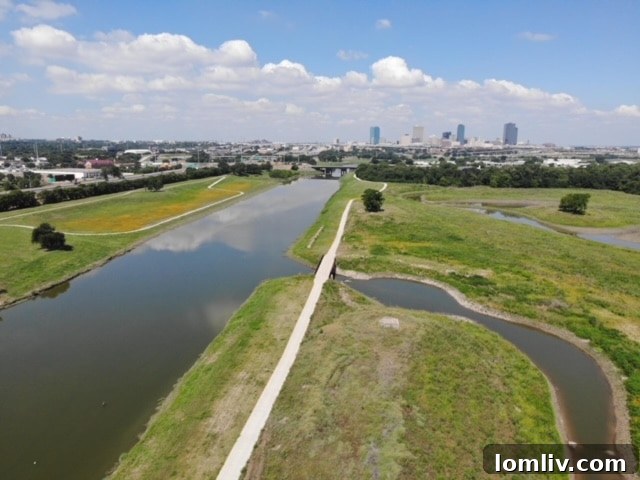 High-Stakes Debate on Panther Island's Future in Fort Worth June 15 4 An image showing the restoration work in the Riverside Oxbow area of the Trinity River. It highlights how the U.S. Army Corps of Engineers' previous levee construction cut off a section of the river, which is now being revitalized to restore natural habitats.