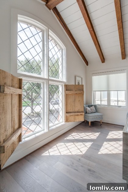 Bedroom view showing updated finishes and natural light in the duplex