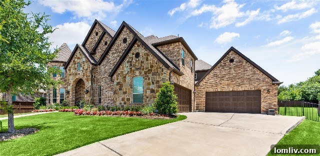 Spacious four-car garage for luxury vehicles in Colleyville home