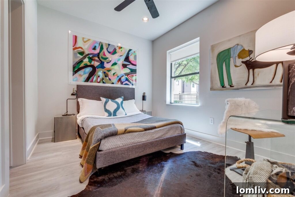 Stylish living room with modern furniture and ample natural light in a Dallas townhome